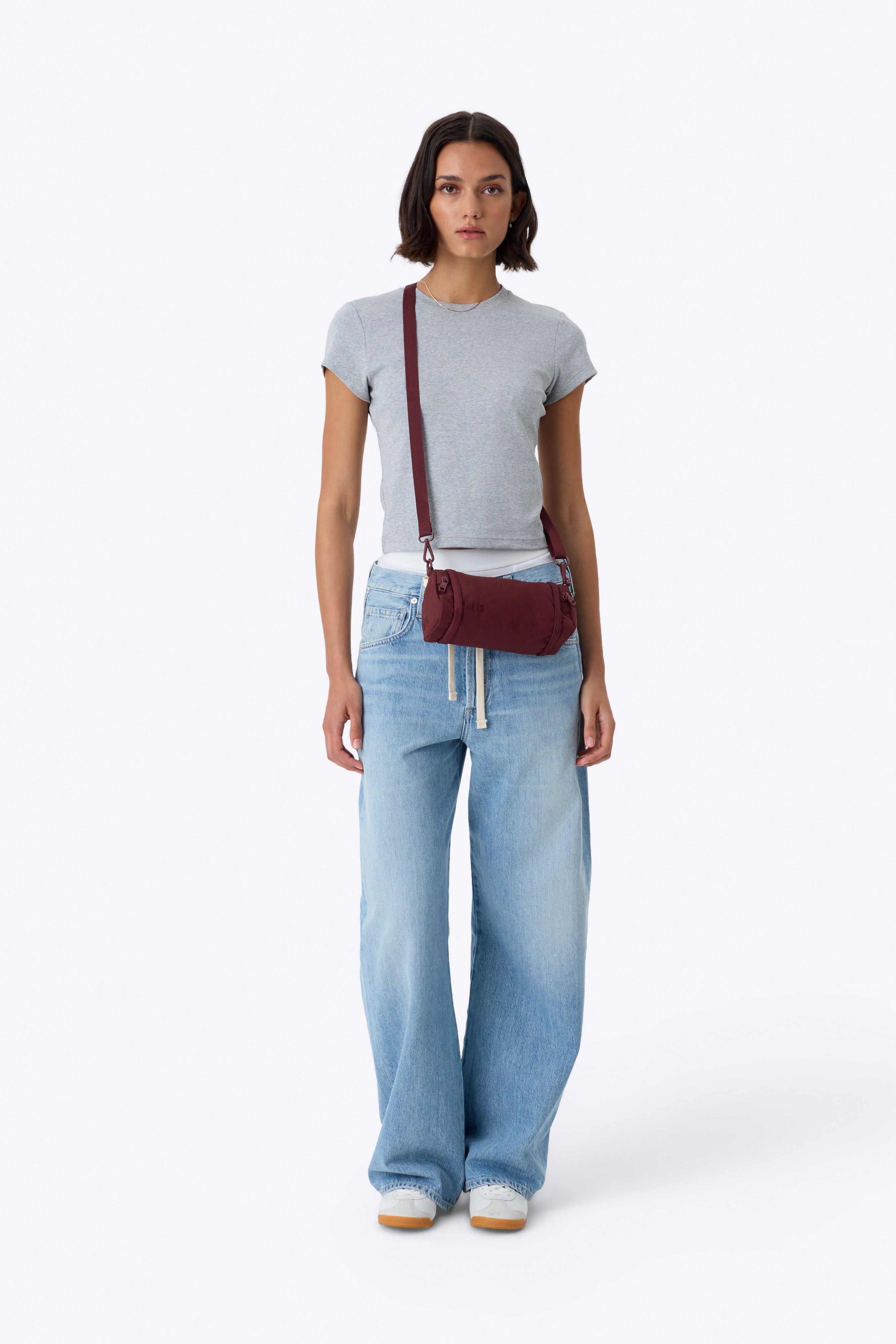 The Expandable Crossbody Charm in Burgundy