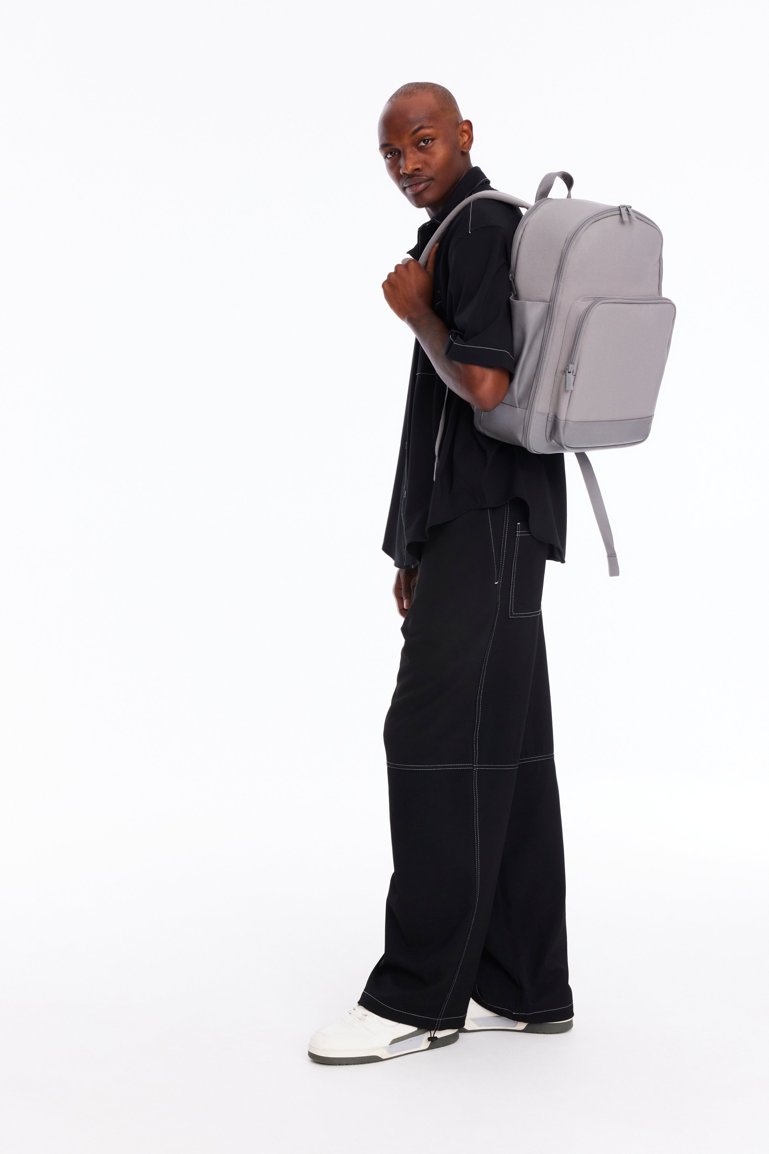The Travel Backpack in Grey